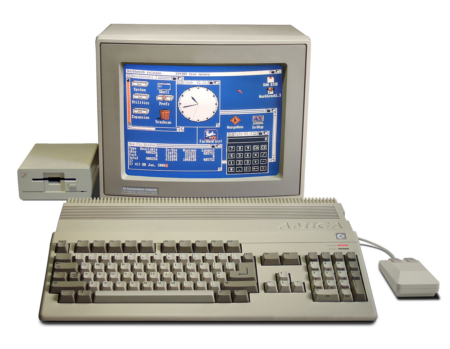 The Amiga 500 personal computer system, pictured with a monitor, a mouse, a keyboard, and a floppy disk drive.